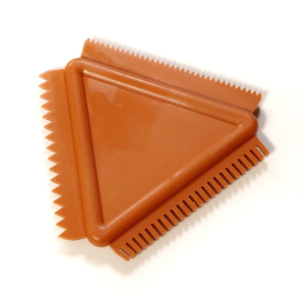 Encaustic rubber comb